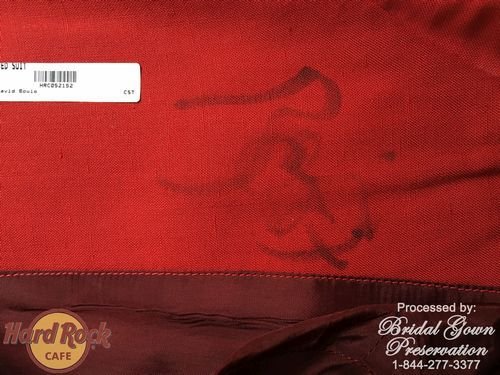 Hard Rock Cafe-David Bowie Red suit-restored by Bridal Gown Preservation.com